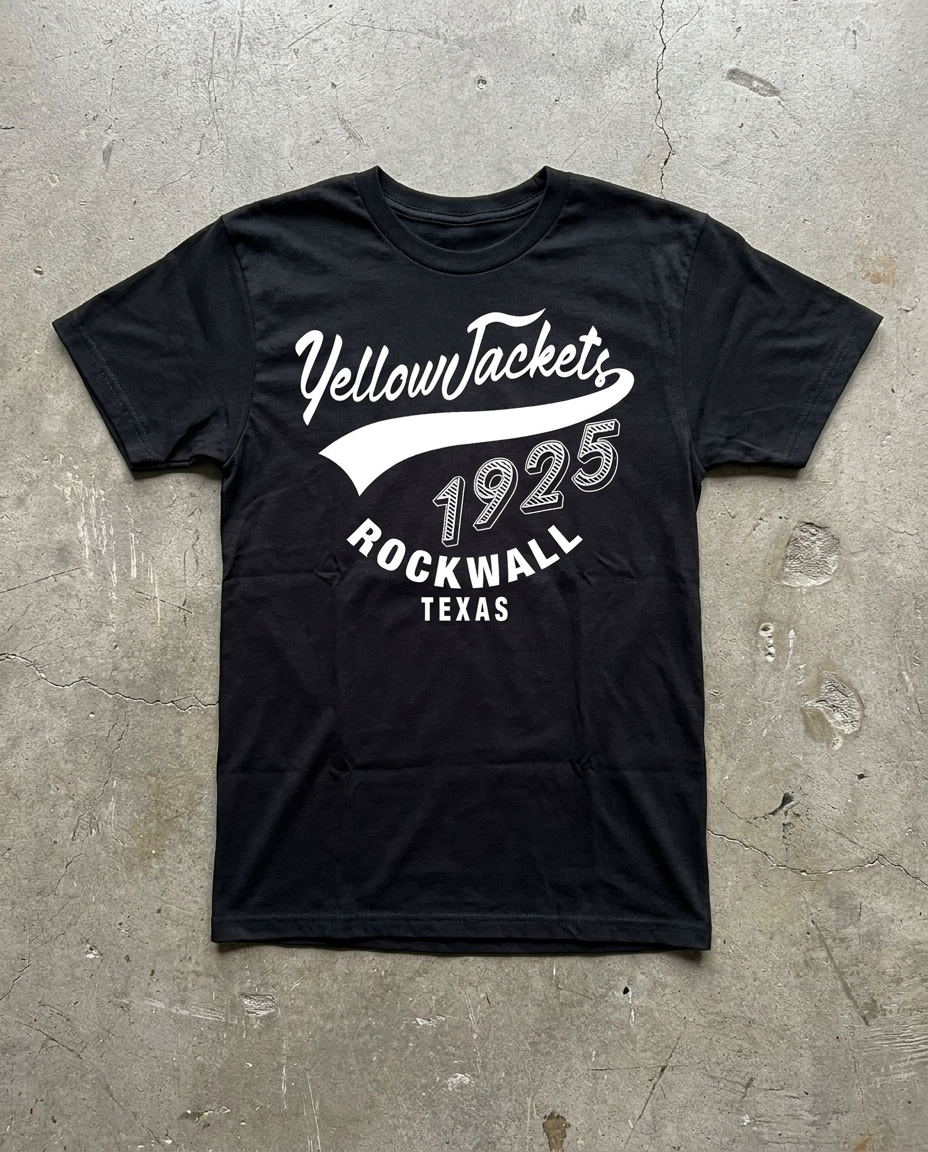 Rockwall Est. 1925 tee in black, YellowJackets script riding a tail sweep over 1925 with ROCKWALL TEXAS beneath