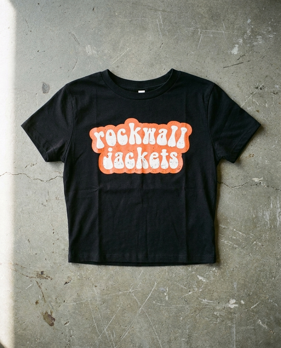 Rockwall Bubble Groove crop tee in black, lowercase rounded rockwall jackets in orange and cream on a cropped ribbed body