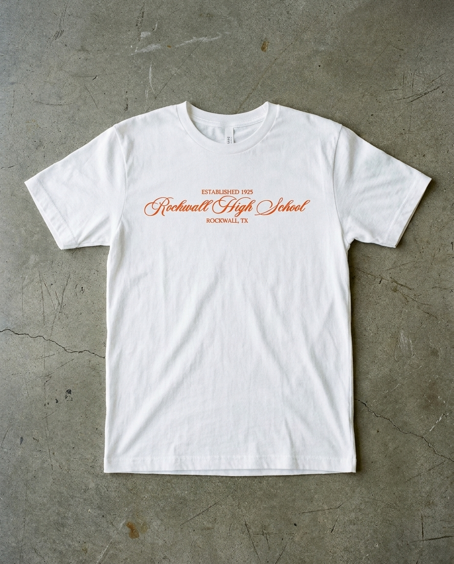 Rockwall Elegant Script tee in white, fine orange script reading Rockwall High School with ESTABLISHED 1925 above and ROCKWALL TX below