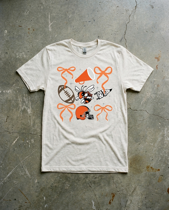 Rockwall Spirit Checkered tee in natural heather, alternate layout with the hornet centered between bows, football, megaphone and helmet