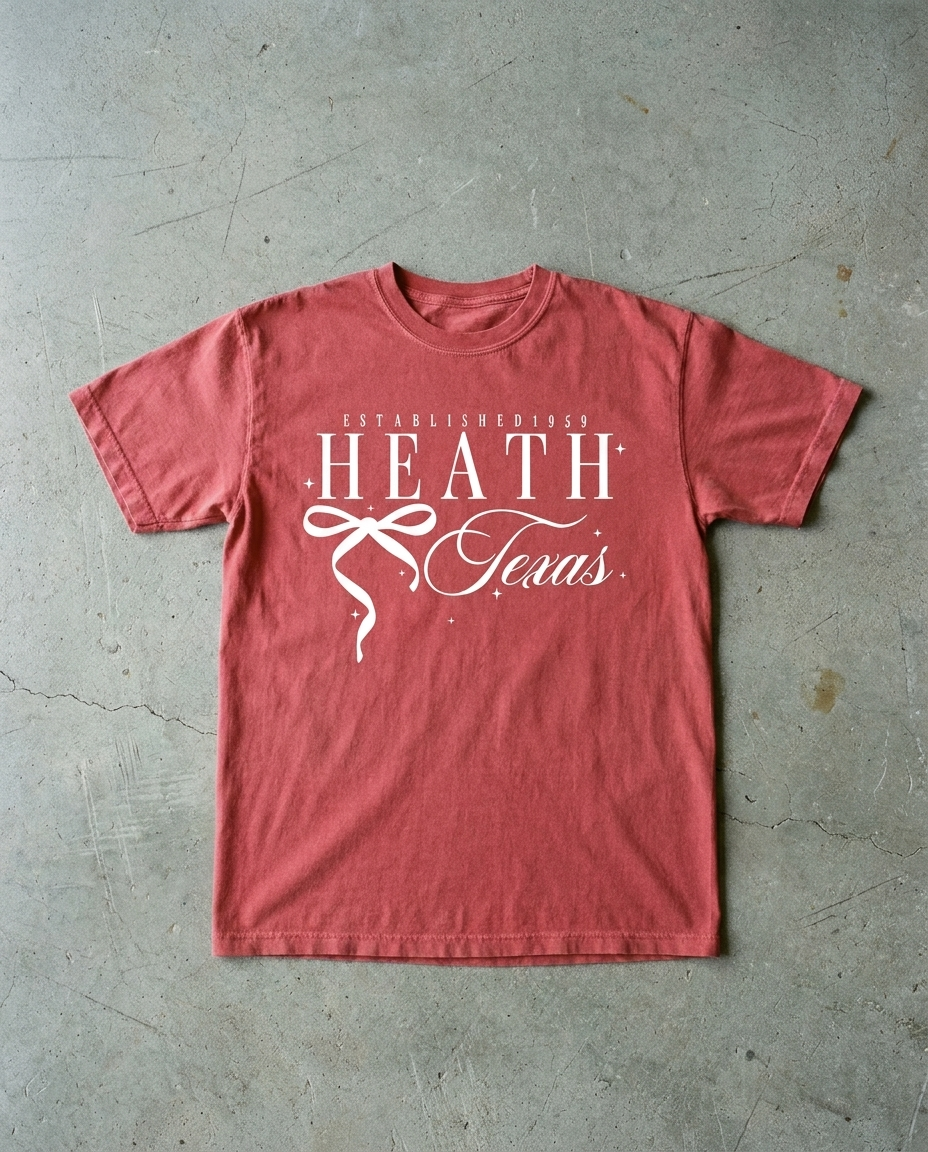 Heath Bow So Cute tee in chili, ESTABLISHED 1959 over HEATH with a ribbon bow and Texas in script, garment dyed Comfort Colors