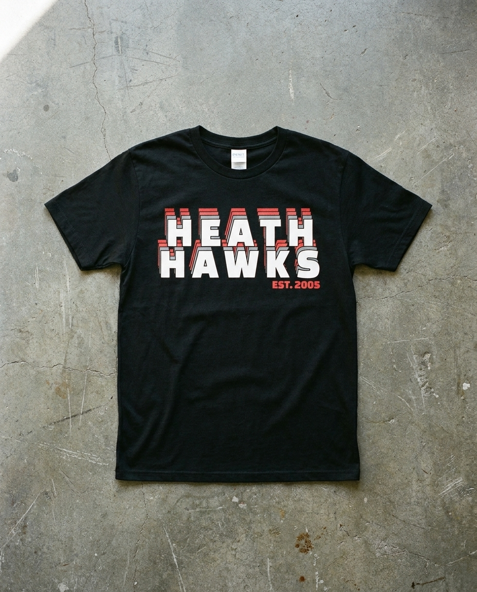 Heath Crescent Roll tee in black, HEATH HAWKS stacked and echoing in white and red with EST. 2005 beneath