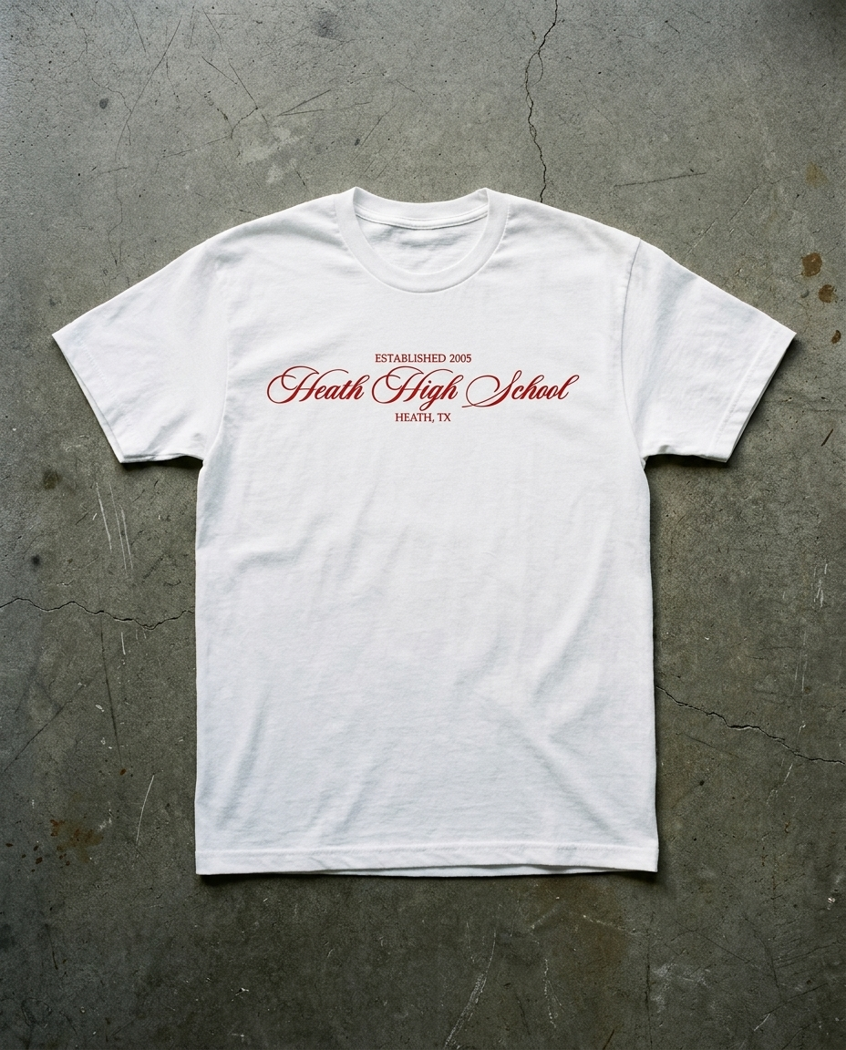 Heath Elegant Script tee in white, fine red script reading Heath High School with ESTABLISHED 2005 above and HEATH TX below