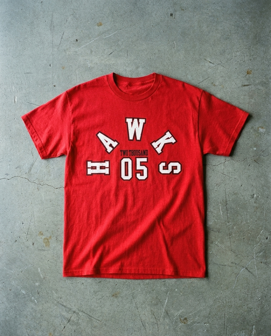 Heath Mega Arch tee in red, white HAWKS stretched wide across the chest with TWO THOUSAND 05 set in the middle